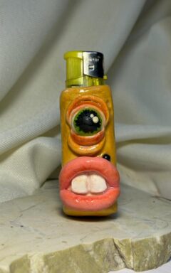 WhatsApp Image 2026-04-02 at 1.00.18 PMk One Eye Alien Lighter Sleeve