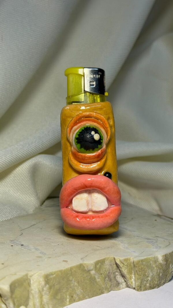 WhatsApp Image 2026-04-02 at 1.00.18 PMk One Eye Alien Lighter Sleeve