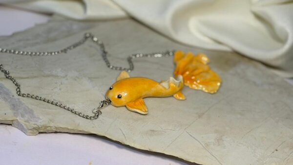 WhatsApp Image 2026-04-02 at 12.42.40 PMaw Gold Fish Statement Pendant
