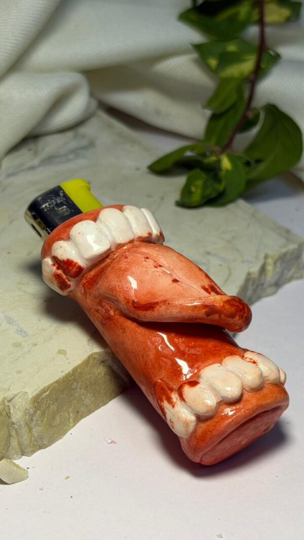 WhatsApp Image 2026rt04-02 at 1.00.21 PM Bloody Bite Lighter Sleeve